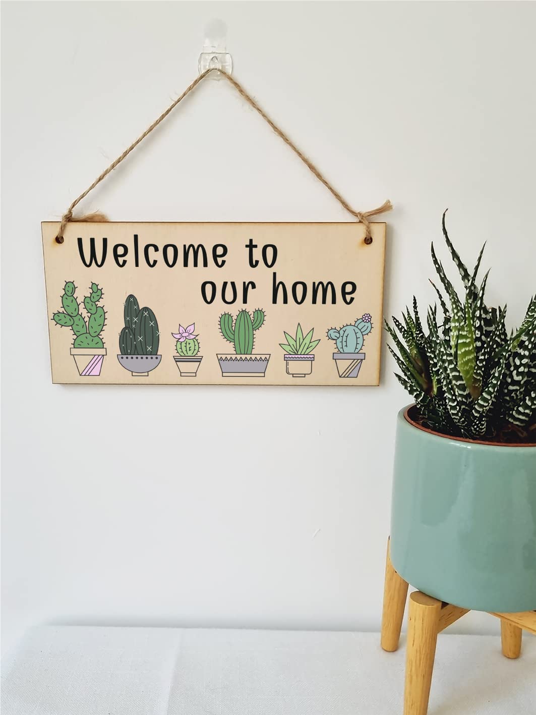 The Plum Penguin Handmade Wooden Hanging Wall Plaque Welcome to Our Home Cactus House Plants Decorative Sign New Home Gift Hallway