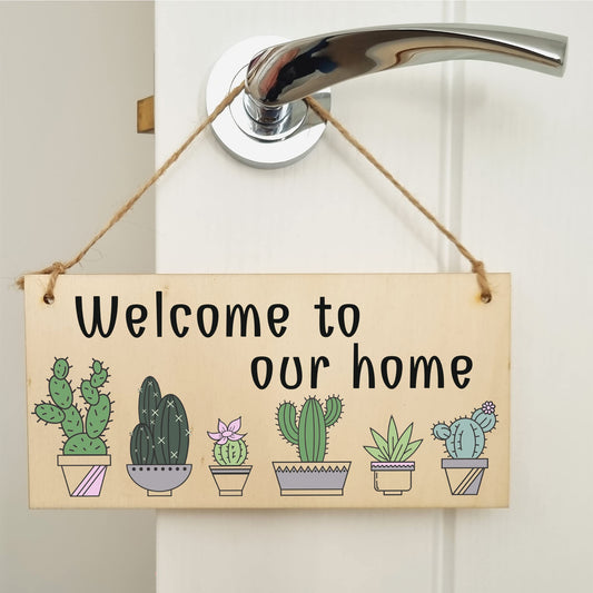The Plum Penguin Handmade Wooden Hanging Wall Plaque Welcome to Our Home Cactus House Plants Decorative Sign New Home Gift Hallway