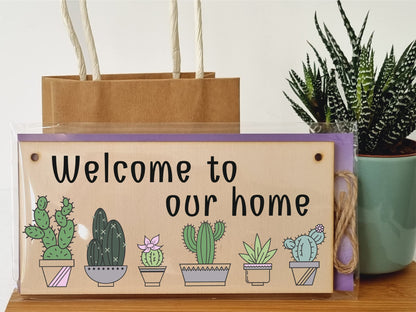 The Plum Penguin Handmade Wooden Hanging Wall Plaque Welcome to Our Home Cactus House Plants Decorative Sign New Home Gift Hallway