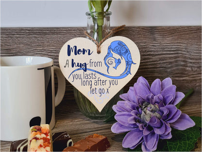 The Plum Penguin Handmade Wooden Hanging Heart Plaque perfect for Mom loving thoughtful special keepsake A hug from you lasts long after you let go card alternative from kids wall hanger