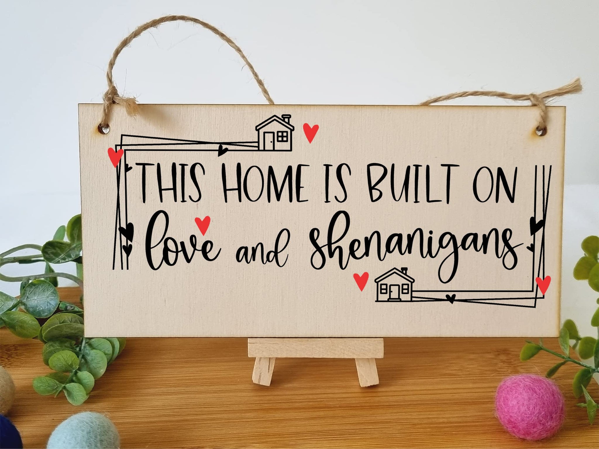 The Plum Penguin Handmade Wooden Hanging Wall Plaque Home Built on Love and Shenanigans Fun Sentimental Decorative Sign Family