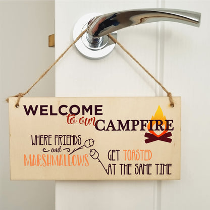 The Plum Penguin Handmade Wooden Hanging Wall Plaque Welcome to our Campfire Friends Roasted Funny Camping Tent Adventure Sign