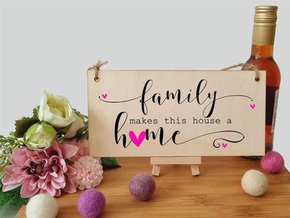 The Plum Penguin Handmade Wooden Hanging Wall Plaque Family Makes this Houose a Home Decorative Sentimental Sign Gift Family
