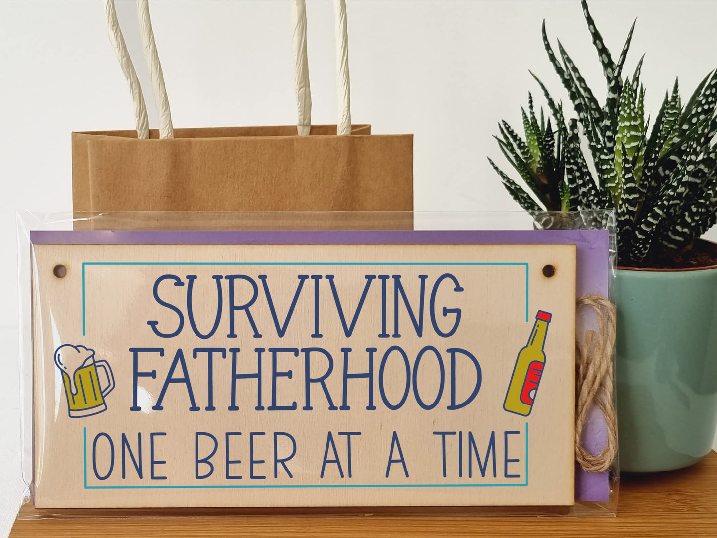 The Plum Penguin Handmade Wooden Hanging Wall Plaque Surviving Fatherhood One Beer at a Time Novelty Sign Man Cave
