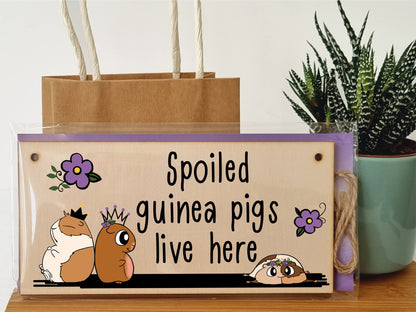 The Plum Penguin Handmade Wooden Hanging Wall Plaque Spoiled Guinea Pigs Live Here Pet Lover Mum Dad Sign